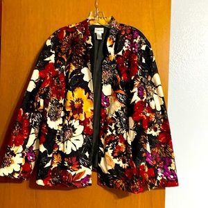 Chico’s. Size 3. Black background with large floral detail.